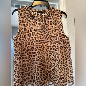 INC women’s top, cheetah print.